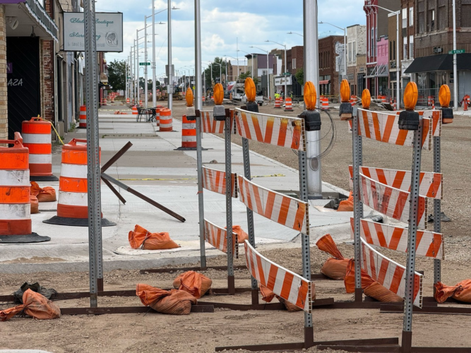 Summer sidewalk sale postponed